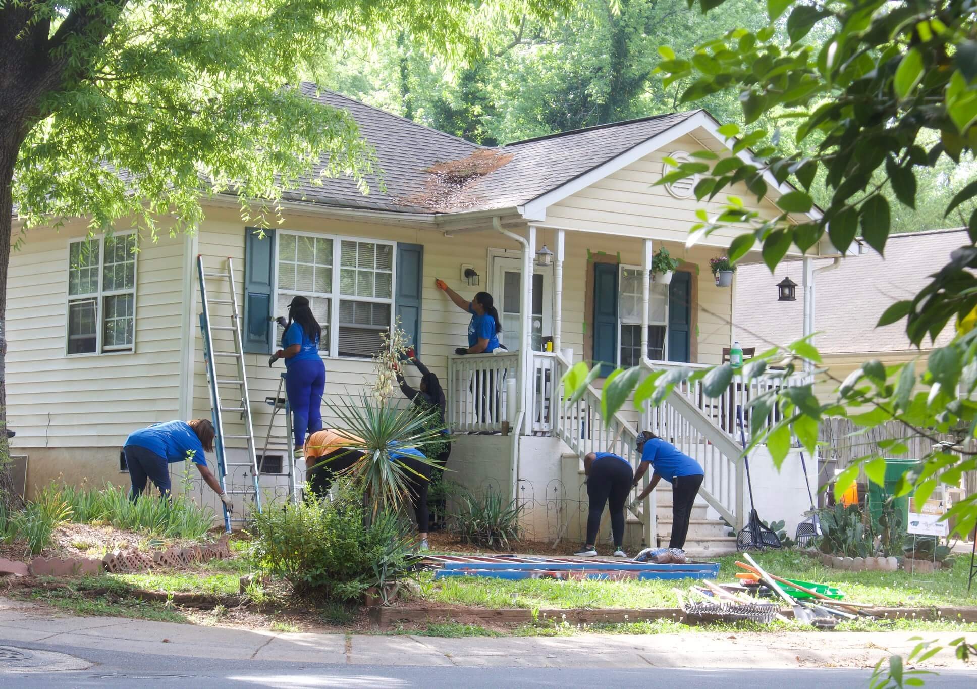 Realtors working on a home as part of REALTORS CARE DAY